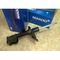 Амортизатор Пер. Лев. Гранд Старекс EX546504H050 Mando